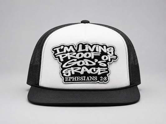 White and black Living Proof trucker hat, embroidered Ephesians 2:8 patch