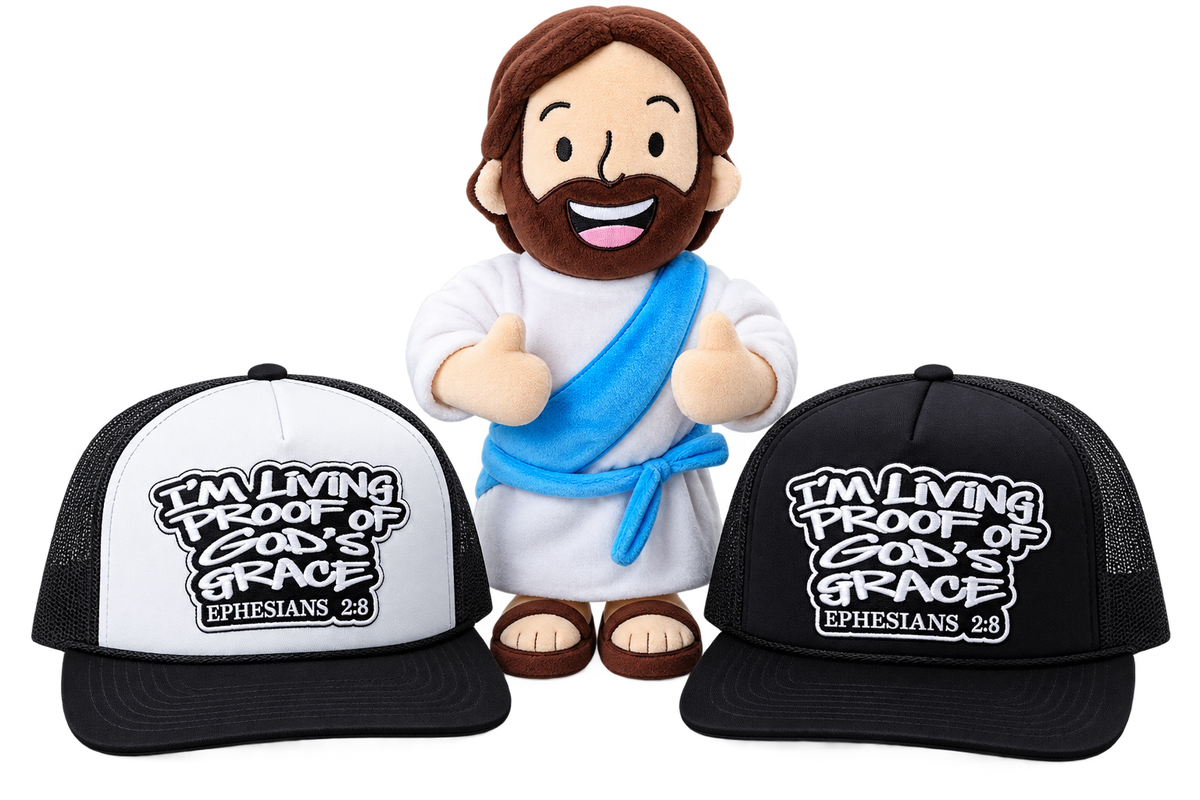 White and black Living Proof trucker hats either side of a plush figure