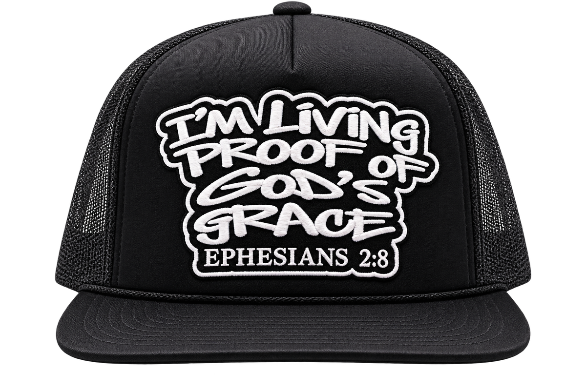 Close view of the black Living Proof trucker hat patch, Ephesians 2:8