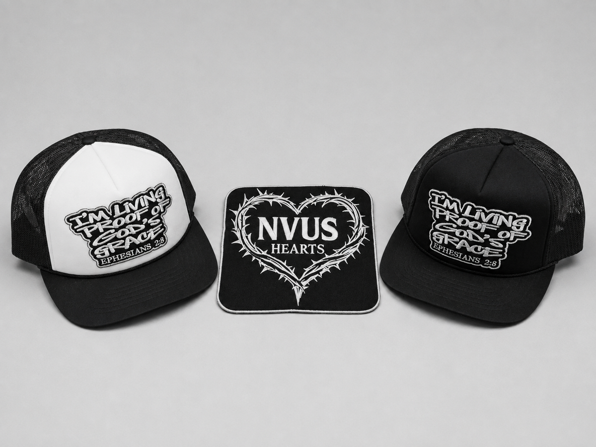 Living Proof trucker hats with the NVUS Hearts thorn-heart patch between them